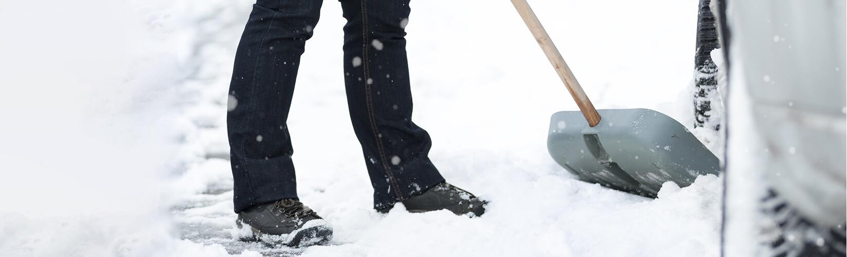 person shoveling snow