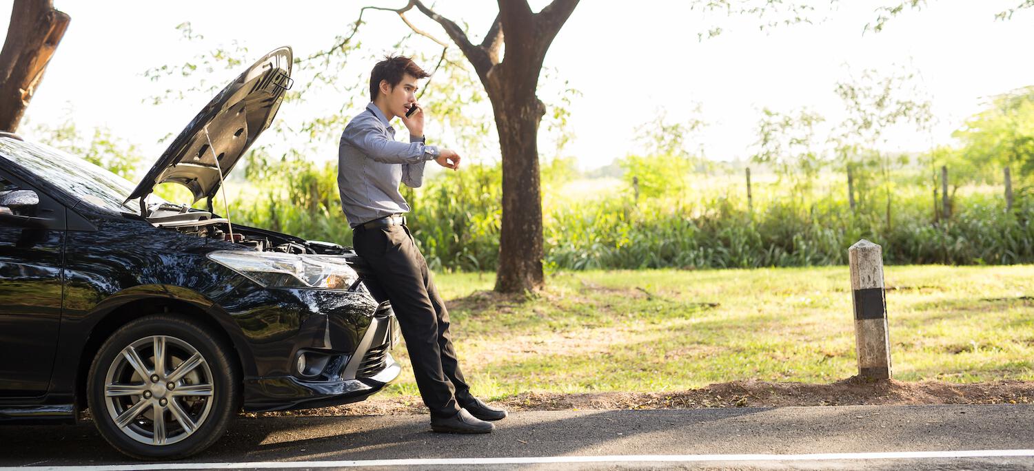 man waiting for car service