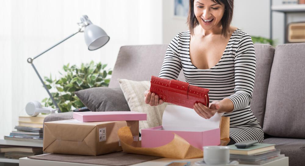 woman opening mail