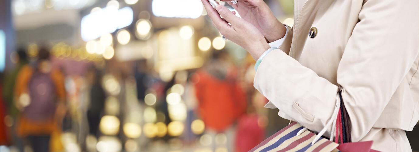 women holding shopping bags