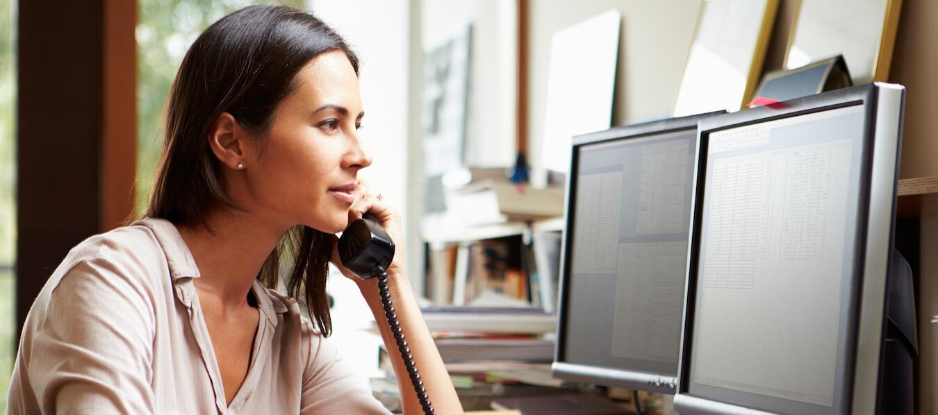 woman talking on telephone