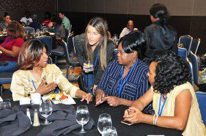 Shraon with colleagues at Liveops event