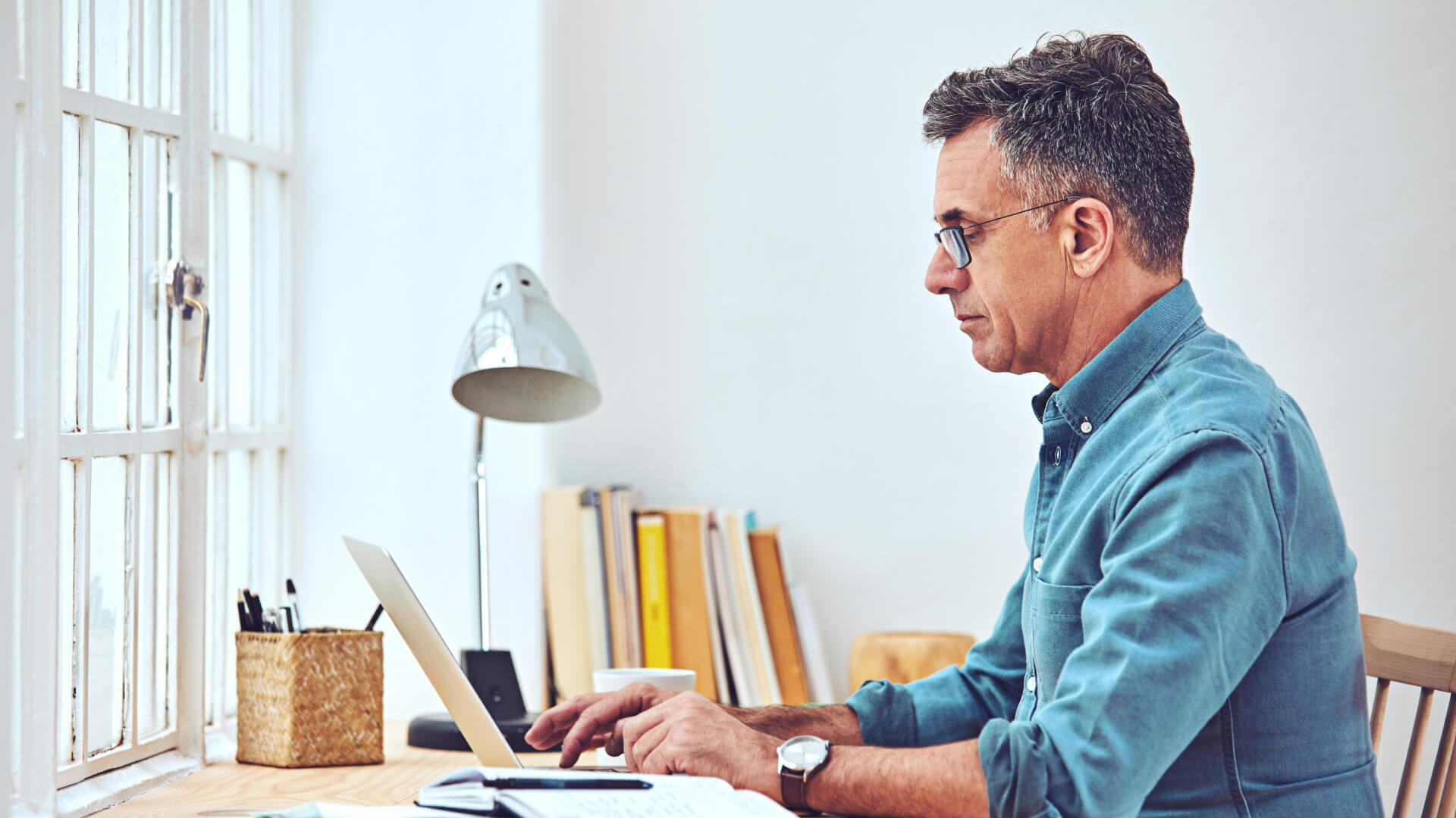 man working on computer